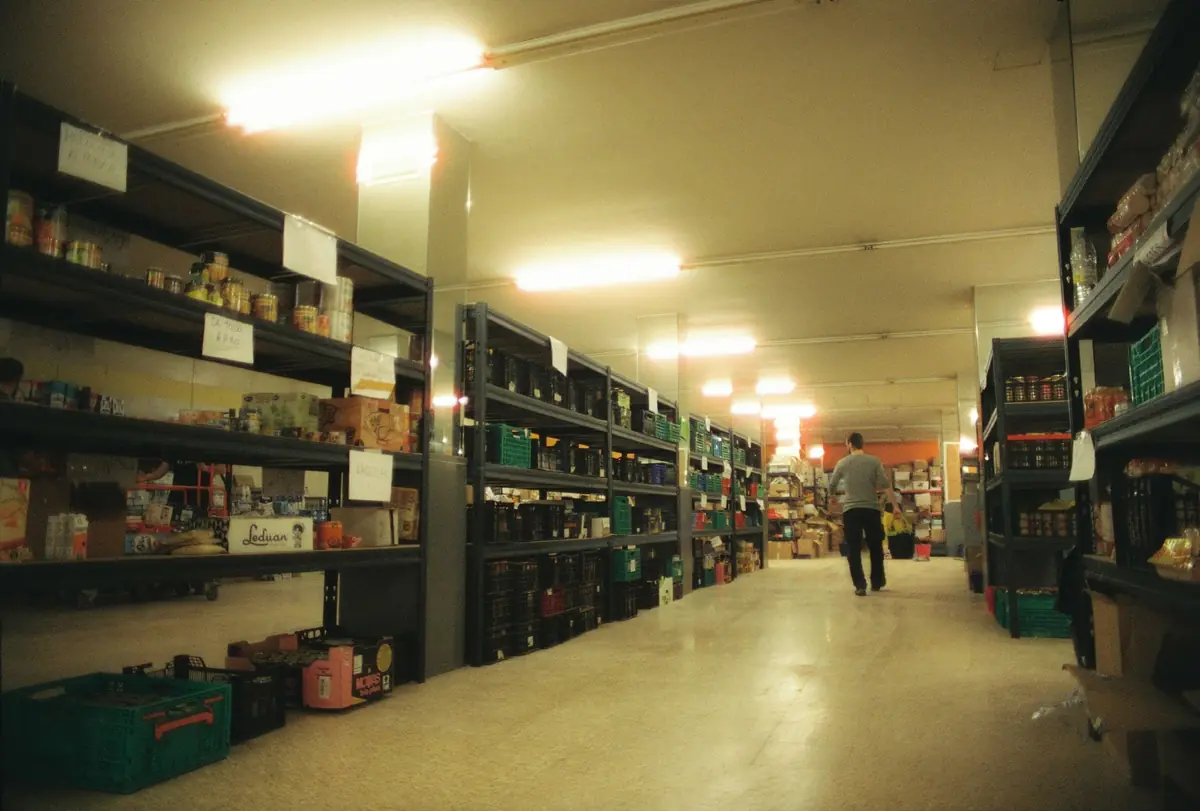 Warehouse aisle with stocked shelving