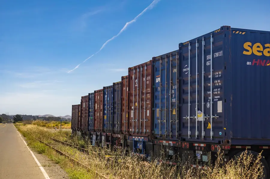 Freight train carrying shipping containers